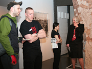 Student docents give tours to visitors.